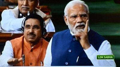 For some time before walking out, the Opposition raised a chorus that went “Manipur, Manipur…” even as the Prime Minister was speaking. (AFP) For some time before walking out, the Opposition raised a chorus that went “Manipur, Manipur…” even as the Prime Minister was speaking. (AFP)