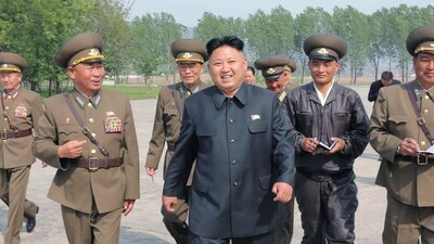 North Korean leader Kim Jong Un walks with officials during an inspection of the Korean People's Army (KPA) Air and Anti-Air Force Unit 44. (Reuters)