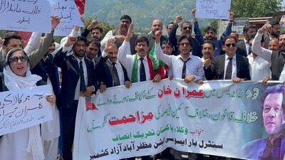 Pro-Pakistan Tehreek-e-Insaf (PTI) party lawyers shout slogans during a protest rally against the arrest of former Prime Minister Imran Khan, in Muzaffarabad (AFP) Pro-Pakistan Tehreek-e-Insaf (PTI) party lawyers shout slogans during a protest rally against the arrest of former Prime Minister Imran Khan, in Muzaffarabad (AFP)