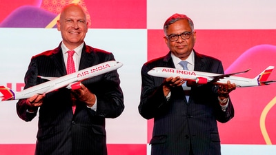 Tata Sons chairman N Chandrashekaran and Air India CEO and MD Campbell Wilson during the unveiling of Air India's new logo in New Delhi on Thursday. (PTI) Tata Sons chairman N Chandrashekaran and Air India CEO and MD Campbell Wilson during the unveiling of Air India's new logo in New Delhi on Thursday. (PTI)