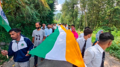 Locals take part in a 'Tiranga Rally' ahead of Independence Day in Anantnag district. (PTI) Locals take part in a 'Tiranga Rally' ahead of Independence Day in Anantnag district. (PTI)