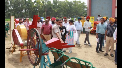 Participants visiting experimental areas of different departments of PAU, Ludhiana, on Friday. (HT)