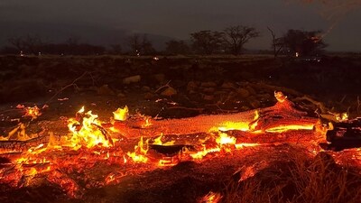 A wildfire burns in Kihei, Hawaii late Wednesday. (AP) A wildfire burns in Kihei, Hawaii late Wednesday. (AP)