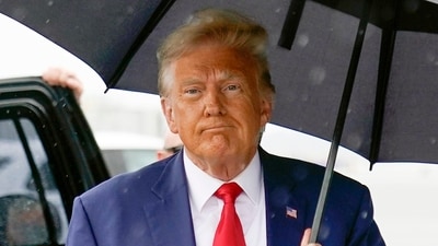 Former President Donald Trump walks to speak with reporters before boarding his plane at Ronald Reagan Washington National Airport, Aug. 3, 2023. (AP) Former President Donald Trump walks to speak with reporters before boarding his plane at Ronald Reagan Washington National Airport, Aug. 3, 2023. (AP)