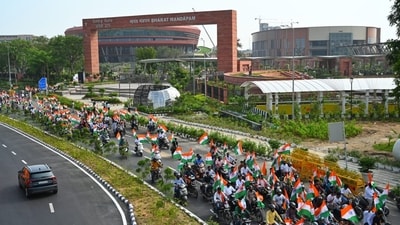 The 'Har Ghar Tiranga 2.0' bike rally crossing the Bharat Mandapam (new India Trade Promotion Organisation (ITPO) complex), which was inaugurated on July 26 by Prime Minister Narendra Modi. (Vipin Kumar/HT Photo) The 'Har Ghar Tiranga 2.0' bike rally crossing the Bharat Mandapam (new India Trade Promotion Organisation (ITPO) complex), which was inaugurated on July 26 by Prime Minister Narendra Modi. (Vipin Kumar/HT Photo)