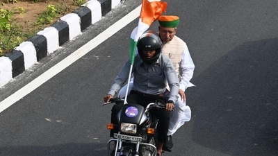Union law minister Arjun Ram Meghwal was seen taking part in the bike rally of the 'Har Ghar Tiranga' from Pragati Maidan to the National Stadium in Delhi on Friday morning. (Vipin Kumar/HT Photo) Union law minister Arjun Ram Meghwal was seen taking part in the bike rally of the 'Har Ghar Tiranga' from Pragati Maidan to the National Stadium in Delhi on Friday morning. (Vipin Kumar/HT Photo)