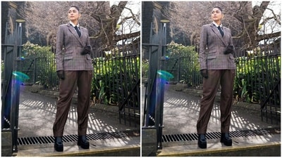 Her outfit consists of a brown checked blazer with full sleeves, a double collar, fake pockets and a fitted bust. She teams it with a crisp white shirt and loose-fitting dark brown trousers. (Instagram/@mrunalthakur) Her outfit consists of a brown checked blazer with full sleeves, a double collar, fake pockets and a fitted bust. She teams it with a crisp white shirt and loose-fitting dark brown trousers. (Instagram/@mrunalthakur)