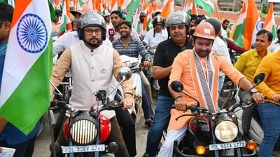 Union ministers Anurag Thakur and Kishan Reddy during 'Har Ghar Tiranga' bike rally in Delhi on Friday. (Vipin Kumar/HT Photo)