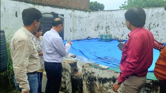 Chandigarh engineering department officials inspected the dilapidated houses in Sector 24 recently. (HT File)