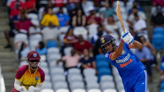 India's Shubman Gill plays a shot to by stumped by West Indies' Roston Chase during their first T20 cricket match at the Brian Lara Stadium in Tarouba (AP)