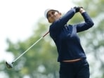 Aditi Ashok of India hits a tee shot
