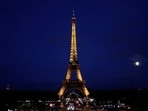 A view shows the illuminated Eiffel Tower in Paris, France, July 30, 2023. REUTERS/Benoit Tessier