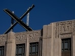 'X' logo is seen on the top of the headquarters of the messaging platform X, formerly known as Twitter, in downtown San Francisco, California, U.S., July 30, 2023.  REUTERS/Carlos Barria
