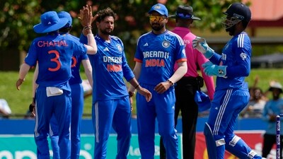 India's Kuldeep Yadav, second from left, celebrates the dismissal of West Indies' Nicholas Pooran during the fourth T20I at Central Broward Regional Park in Lauderhill (AP) India's Kuldeep Yadav, second from left, celebrates the dismissal of West Indies' Nicholas Pooran during the fourth T20I at Central Broward Regional Park in Lauderhill (AP)