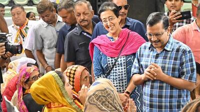 CM Kejriwal meets pilgrims ahead of their journey on Saturday. (HT Photo) CM Kejriwal meets pilgrims ahead of their journey on Saturday. (HT Photo)