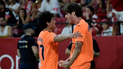 Valencia's Spanish midfielder #8 Javi Guerra celebrates scoring his team's second goal with Valencia's Spanish midfielder #27 Pablo Gozalbez (L) (AFP) Valencia's Spanish midfielder #8 Javi Guerra celebrates scoring his team's second goal with Valencia's Spanish midfielder #27 Pablo Gozalbez (L) (AFP)