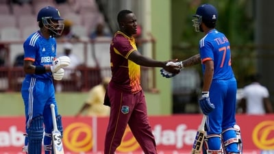 India's Tilak Varma (Right) shakes hands with Rovman Powell as Hardik Pandya looks on after India's 7-wicket win. (AP) India's Tilak Varma (Right) shakes hands with Rovman Powell as Hardik Pandya looks on after India's 7-wicket win. (AP)