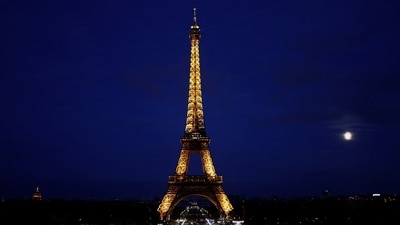 A view shows the illuminated Eiffel Tower in Paris, France, July 30, 2023. REUTERS/Benoit Tessier (REUTERS)