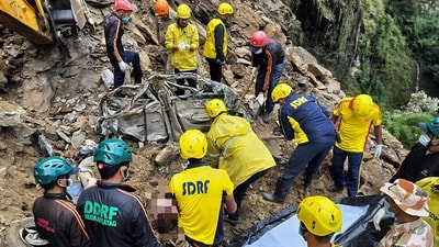 SDRF people carry out rescue work after incidents of landslide on Kedarnath highway due to rain, in Rudraprayag. (PTI) SDRF people carry out rescue work after incidents of landslide on Kedarnath highway due to rain, in Rudraprayag. (PTI)