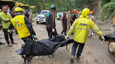 SDRF people carry out rescue work after incidents of landslide on Kedarnath highway due to rain. (PTI) SDRF people carry out rescue work after incidents of landslide on Kedarnath highway due to rain. (PTI)