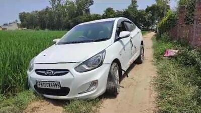 The car in which the suspected drug smugglers were moving before the encounter took place in Tarn Taran on Saturday. (HT Photo) The car in which the suspected drug smugglers were moving before the encounter took place in Tarn Taran on Saturday. (HT Photo)