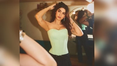 With the help of celebrity fashion stylist Mohit Rai, Khushi accessorised her look with multiple gold bracelets on her wrist, golden drop-down statement earrings and a pair of transparent heels. (Instagram/@mohitrai)