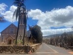 CORRECTION / Burned houses are seen adjacent of Maria Lanakila Catholic Church, on Waine street, in the aftermath of a wildfire in Lahaina, western Maui, Hawaii on August 11, 2023. A wildfire that left Lahaina in charred ruins has killed at least 55 people, authorities said on August 10, making it one of the deadliest disasters in the US state's history. Brushfires on Maui, fueled by high winds from Hurricane Dora passing to the south of Hawaii, broke out August 8 and rapidly engulfed Lahaina. (Photo by Paula RAMON / AFP) / �The erroneous mention[s] appearing in the metadata of this photo by Paula RAMON has been modified in AFP systems in the following manner: [August 11] instead of [August 10]. Please immediately remove the erroneous mention[s] from all your online services and delete it (them) from your servers. If you have been authorized by AFP to distribute it (them) to third parties, please ensure that the same actions are carried out by them. Failure to promptly comply with these instructions will entail liability on your part for any continued or post notification usage. Therefore we thank you very much for all your attention and prompt action. We are sorry for the inconvenience this notification may cause and remain at your disposal for any further information you may require.�