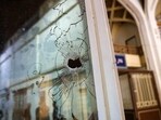 A bullet hole is seen after an attack at the Shah Cheragh Shrine in Shiraz, Iran August 13, 2023.