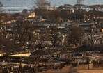 Burned houses and buildings are pictured in the aftermath of a wildfire, is seen in Lahaina, western Maui, Hawaii on August 12, 2023. Burned houses and buildings are pictured in the aftermath of a wildfire, is seen in Lahaina, western Maui, Hawaii on August 12, 2023.