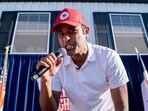 US entrepreneur and 2024 Presidential hopeful Vivek Ramaswamy raps after doing a Fair Side Chat with Governor Kim Reynolds, at the Iowa State Fair in Des Moines, Iowa, on August 12, 2023. 