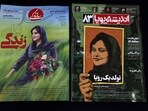 A picture shows Iranian magazines Sazandegi (L) and Andisheh reporting on the death of Mahsa Amini, a woman who died after being arrested by the Islamic republic's "morality police", in Tehran on March 14, 2023. A picture shows Iranian magazines Sazandegi (L) and Andisheh reporting on the death of Mahsa Amini, a woman who died after being arrested by the Islamic republic's "morality police", in Tehran on March 14, 2023.