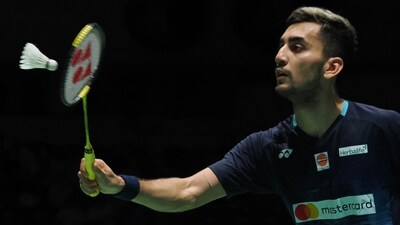 Lakshya Sen of India hits a return against Jonatan Christie of Indonesia during their men's singles semi final match in the fifth day of the Japan Open (AFP) Lakshya Sen of India hits a return against Jonatan Christie of Indonesia during their men's singles semi final match in the fifth day of the Japan Open (AFP)