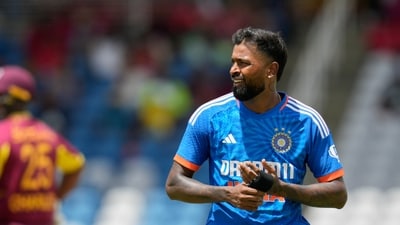 India's captain Hardik Pandya prepares to bowl against West Indies during their first T20 cricket match at the Brian Lara Stadium in Tarouba (AP) India's captain Hardik Pandya prepares to bowl against West Indies during their first T20 cricket match at the Brian Lara Stadium in Tarouba (AP)