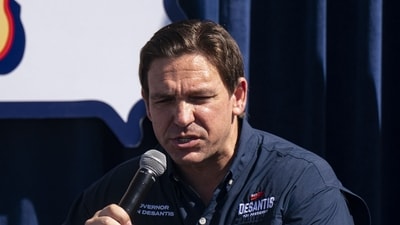 Ron DeSantis, governor of Florida and 2024 Republican presidential candidate, speaks during a Fair-Side Chat with Iowa Governor Kim Reynolds at the Iowa State Fair in Des Moines, Iowa, US, on Saturday, Aug. 12, 2023. Republican presidential hopefuls are crowding into Des Moines this weekend, hoping to make enough of an impression that voters will remember them come the Jan. 15 party caucuses. Photographer: Al Drago/Bloomberg (Bloomberg) Ron DeSantis, governor of Florida and 2024 Republican presidential candidate, speaks during a Fair-Side Chat with Iowa Governor Kim Reynolds at the Iowa State Fair in Des Moines, Iowa, US, on Saturday, Aug. 12, 2023. Republican presidential hopefuls are crowding into Des Moines this weekend, hoping to make enough of an impression that voters will remember them come the Jan. 15 party caucuses. Photographer: Al Drago/Bloomberg (Bloomberg)