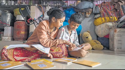 Mumbai, India - Aug. 12, 2023: School students of GV Scheme school in Mulund west are unable to go to school for past 2 months because of unavailability for BEST school buses. In pic, Sibling Simran and Anmol Devipuja at their house in Chinch Pada Airoli in Navi Mumbai, India, on Saturday, August 12, 2023. (Photo by Satish Bate/ Hindustan Times) (Hindustan Times) Mumbai, India - Aug. 12, 2023: School students of GV Scheme school in Mulund west are unable to go to school for past 2 months because of unavailability for BEST school buses. In pic, Sibling Simran and Anmol Devipuja at their house in Chinch Pada Airoli in Navi Mumbai, India, on Saturday, August 12, 2023. (Photo by Satish Bate/ Hindustan Times) (Hindustan Times)