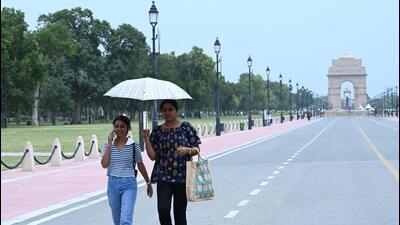People walk on Kartavya Path during a hot afternoon, in New Delhi on Sunday (Arvind Yadav/HT Photo) People walk on Kartavya Path during a hot afternoon, in New Delhi on Sunday (Arvind Yadav/HT Photo)