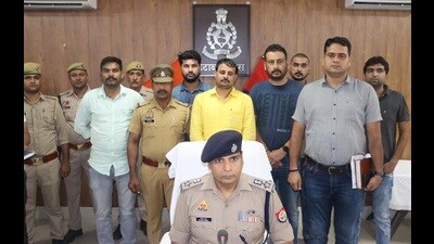 SP leader Manish Yadav Patre O(in yellow shirt) after his arrest in U.P.’s Etawah district on August 13. (Sourced)
