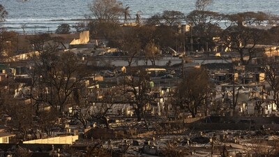 Burned houses and buildings are pictured in the aftermath of a wildfire, is seen in Lahaina, western Maui, Hawaii on August 12, 2023. Hawaii's Attorney General, Anne Lopez, said August 11, she was opening a probe into the handling of devastating wildfires that killed at least 80 people in the state this week, as criticism grows of the official response. The announcement and increased death toll came as residents of Lahaina were allowed back into the town for the first time. (Photo by Yuki IWAMURA / AFP) (AFP) Burned houses and buildings are pictured in the aftermath of a wildfire, is seen in Lahaina, western Maui, Hawaii on August 12, 2023. Hawaii's Attorney General, Anne Lopez, said August 11, she was opening a probe into the handling of devastating wildfires that killed at least 80 people in the state this week, as criticism grows of the official response. The announcement and increased death toll came as residents of Lahaina were allowed back into the town for the first time. (Photo by Yuki IWAMURA / AFP) (AFP)