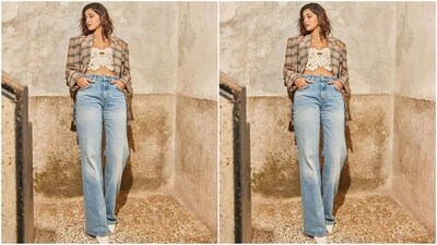 Her outfit consists of a white macadamia velvet lace bodice, briney blue wide-legged jeans and an oversized checked blazer with full sleeves, lapel collar and black plaid on a beige background. (Instagram/@ananyapanday) Her outfit consists of a white macadamia velvet lace bodice, briney blue wide-legged jeans and an oversized checked blazer with full sleeves, lapel collar and black plaid on a beige background. (Instagram/@ananyapanday)