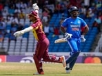 West Indies' Nicholas Pooran celebrates the dismissal of India's Sanju Samson West Indies' Nicholas Pooran celebrates the dismissal of India's Sanju Samson