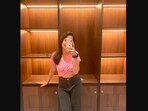 A woman shared this picture of herself and asked netizens to guess her height. A woman shared this picture of herself and asked netizens to guess her height.