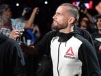 CM Punk entered the arena to his trademark music. (AP)