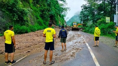 Debris being removed from a road in Rishikesh (Hindustan Times) Debris being removed from a road in Rishikesh (Hindustan Times)