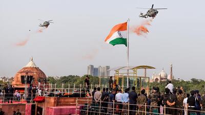 ALH Dhruv choppers of the Indian Air Force shower flower petals during the full dress rehearsal for the Independence Day celebrations at Red Fort in Delhi. (ANI) ALH Dhruv choppers of the Indian Air Force shower flower petals during the full dress rehearsal for the Independence Day celebrations at Red Fort in Delhi. (ANI)