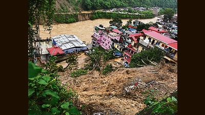 Buildings washed away in Mandi in Himachal Pradesh after torrential rains. (REUTERS) Buildings washed away in Mandi in Himachal Pradesh after torrential rains. (REUTERS)