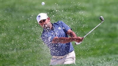 Anirban Lahiri of Crushers GC hits his shot from a bunker on the fourth hole during day three of the LIV Golf Invitational. (Getty Images via AFP) Anirban Lahiri of Crushers GC hits his shot from a bunker on the fourth hole during day three of the LIV Golf Invitational. (Getty Images via AFP)