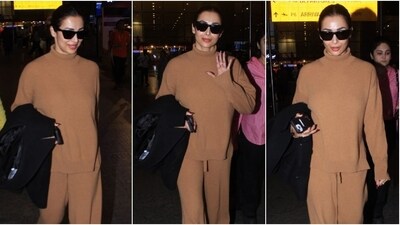 Malaika Arora returned to Mumbai after attending the Indian Film Festival Of Melbourne 2023 in Melbourne. Today, the paparazzi clicked Malaika at the Mumbai airport. The pictures show Malaika exiting the airport dressed in a monotone ensemble, serving effortless and elegant jet-set fashion tips. Scroll through to see her photos and steal styling tips for your next flight. (Instagram) Malaika Arora returned to Mumbai after attending the Indian Film Festival Of Melbourne 2023 in Melbourne. Today, the paparazzi clicked Malaika at the Mumbai airport. The pictures show Malaika exiting the airport dressed in a monotone ensemble, serving effortless and elegant jet-set fashion tips. Scroll through to see her photos and steal styling tips for your next flight. (Instagram)
