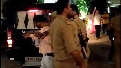 One of the suspects being taken into custody. (HT Photo) One of the suspects being taken into custody. (HT Photo)