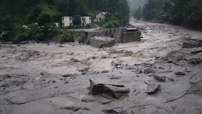 A bridge over swelled Pranwati River was washed away in Chamoli district in Uttarakhand. (Hindustan Times) A bridge over swelled Pranwati River was washed away in Chamoli district in Uttarakhand. (Hindustan Times)