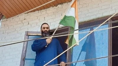 Rayees Mattoo, the brother of Hizbul terrorist Javid Mattoo, was seen hoisting the national flag at his residence in Jammu and Kashmir’s Sopore. (ANI) Rayees Mattoo, the brother of Hizbul terrorist Javid Mattoo, was seen hoisting the national flag at his residence in Jammu and Kashmir’s Sopore. (ANI)